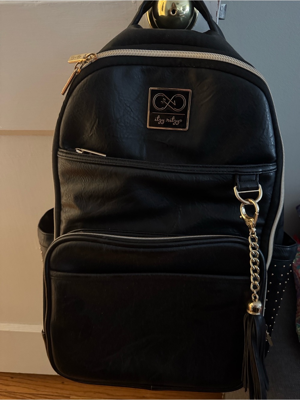 Itzy Ritzy Black Faux Leather Baby Bag Backpack with Gold Hardware